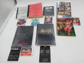 A collection of itineraries and passes from tours by AC/DC consisting of:- The Razors Edge tour,