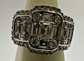 18ct Art Deco style white gold diamond cluster ring, with various baguette and brilliant cut stones,