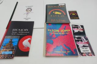 Group of itineraries for Elton John, 1999 Europe tour, book 3., with laminate pass. Elton John 2000,