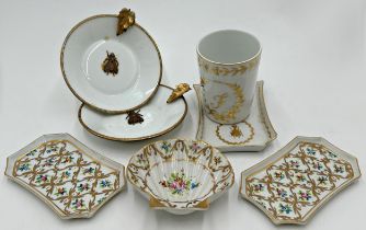 Collection of Limoges cabinet porcelain to include three pin trays, scallop shell dish, beaker and