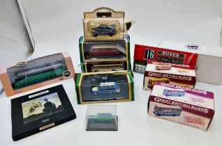 Collection of vintage boxed vehicles to include cars, buses & trams (9)
