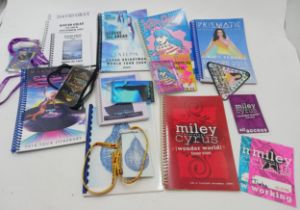 10 tour itineraries for:- Miley Cyrus, Wonderful World tour, 2009, with one laminate pass and two