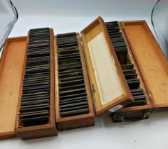 Three boxes of magic lantern slides. Includes scenic, topographical, trains & other topics.