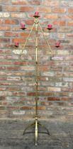 Gilt iron ecclesiastical floor standing candelabra, H 167cm
