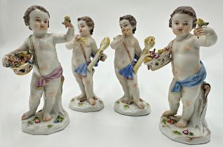 Two pairs of Meissen porcelain figures of wheat picking and flower picking putti, each 14cm high (4)