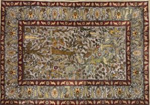 Exceptional quality Persian silk Tree of Life rug, in relief with birds amidst branches on lustred