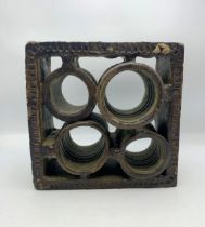 Abstract studio pottery brick type sculpture, with four cylinder shape vessels in a square frame, 29