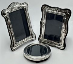 Two similar silver applied Art Nouveau style easel photograph frames, internal measurement 13 x 8.