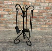 Regency wrought iron fireside companion set with shovel, brush, poker & tongs. H 78cm.