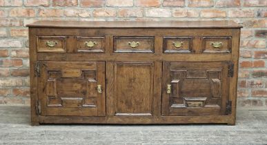 Early Georgian period Welsh oak geometric split moulded dresser base, three drawers and two cupboard