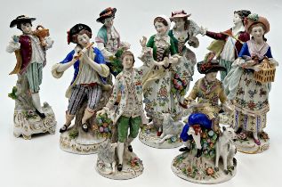 Collection of nine Sitzendorf porcelain figures, the largest 24cm high