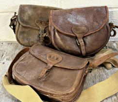 Three good quality antique leather cartridge bags