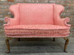 Early and rare Parker Knoll Queen Anne style sofa, wing back and cabriole legs with gilt highlights,