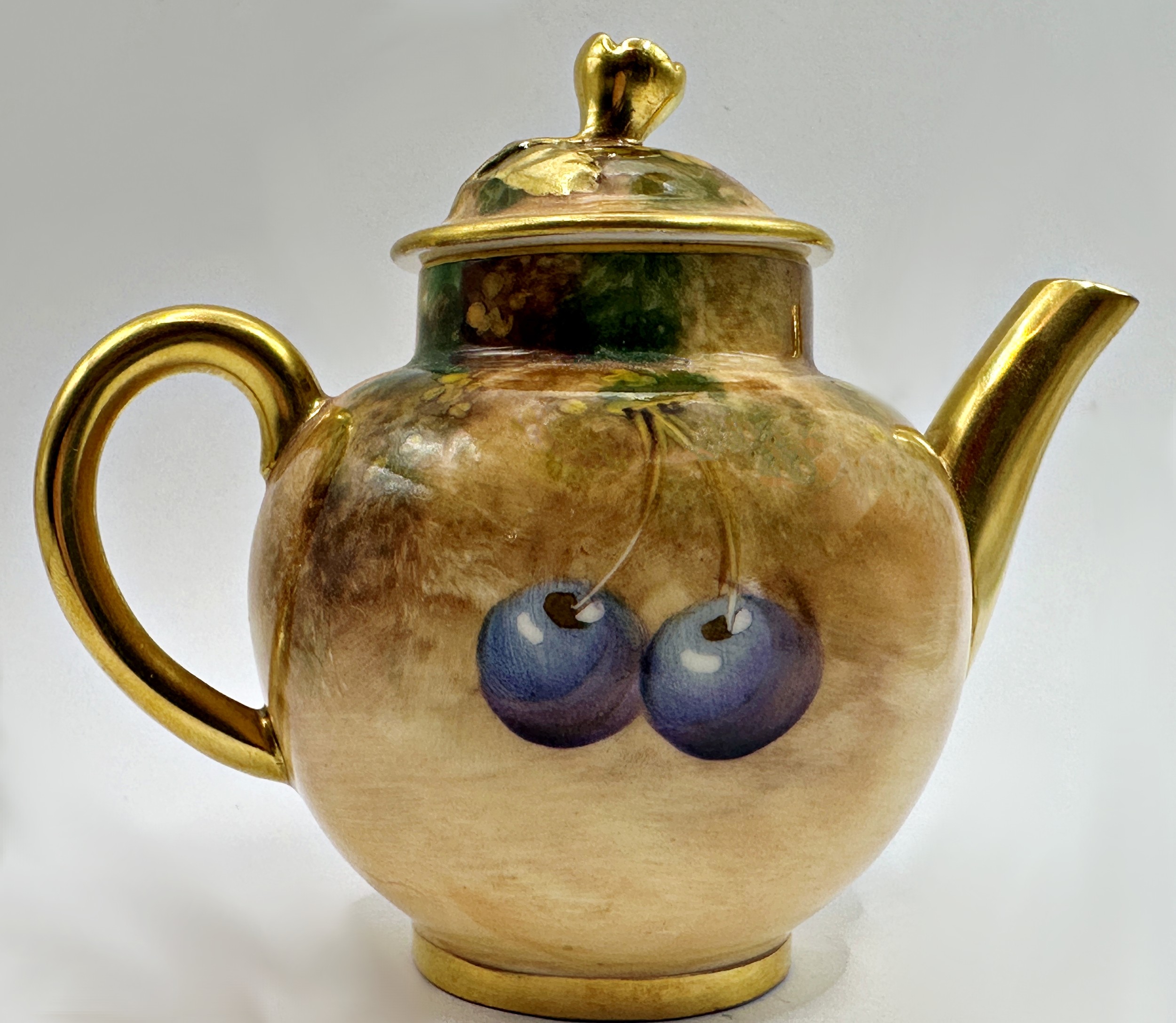 Royal Worcester hand painted miniature teapot by Frank Roberts, fruits in a grotto setting, gilt - Image 4 of 4