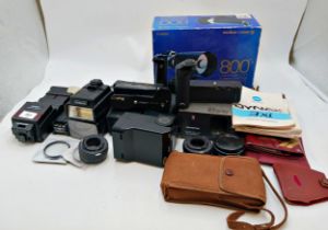 Assortment of camera accessories to include flashes, lens caps, converters & Bausch and Lomb 800mm