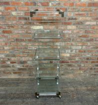 Probably by Charles Hollis Jones - Lucite and brass whatnot / bookcase, with four glass shelves and