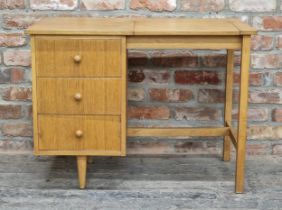 1950s teak desk / dressing table, the hinged top with mirror to the reverse and three drawers, H