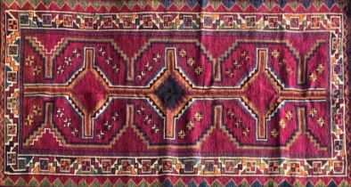 Good quality Persian Lori rug, bespoke medallion design on purple ground, 270 x 130cm