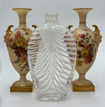 Pair of Royal Worcester blush ivory twin handled vases with typical floral sprays, 20.5cm high