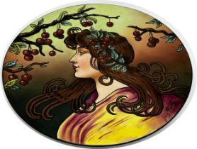 Good large Art Nouveau porcelain charger, hand painted with the bust of a young lady amidst ripe