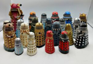 Collection of multi-coloured plastic Dalek figures. Largest measures 22cm.
