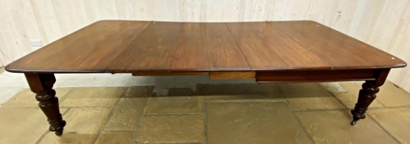 Large mid 19th century mahogany extending dining table to comfortably seat twelve, on good turned