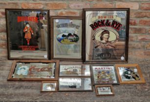 Collection of ten pub advertising mirrors to include Beefeater Gin, Southern Comfort, Black and