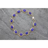 Good quality 9ct Lapis Lazuli cabochon bracelet, 19cm long, 11g