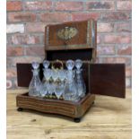 French walnut wood veneered and brass-inlaid 'cave Ã liqueur' with four carafes and sixteen glasses,