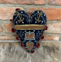 Victorian heart shaped sailors valentine cushion. Decorated with a sequenced finish throughout and