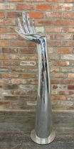 Contemporary silvered resin hand sculpture or torchere stand, H 137cm x W 40cm