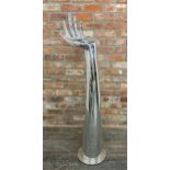 Contemporary silvered resin hand sculpture or torchere stand, H 137cm x W 40cm