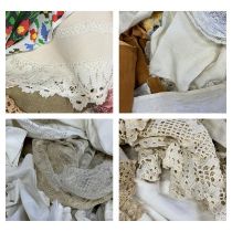 Large quantity of vintage linen, crocheted table cloths etc (four boxes)