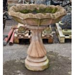 Large two piece reconstituted stone garden urn with spiral twist column and flared rim, H 92cm x W