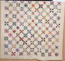 Two late 19th century patchwork quilts, largest approx 190cm x 180cm (2)