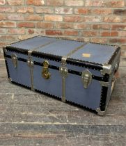 Vintage luggage flight case or trunk, with rivetted frame and original travel stickers, 38cm x 100cm