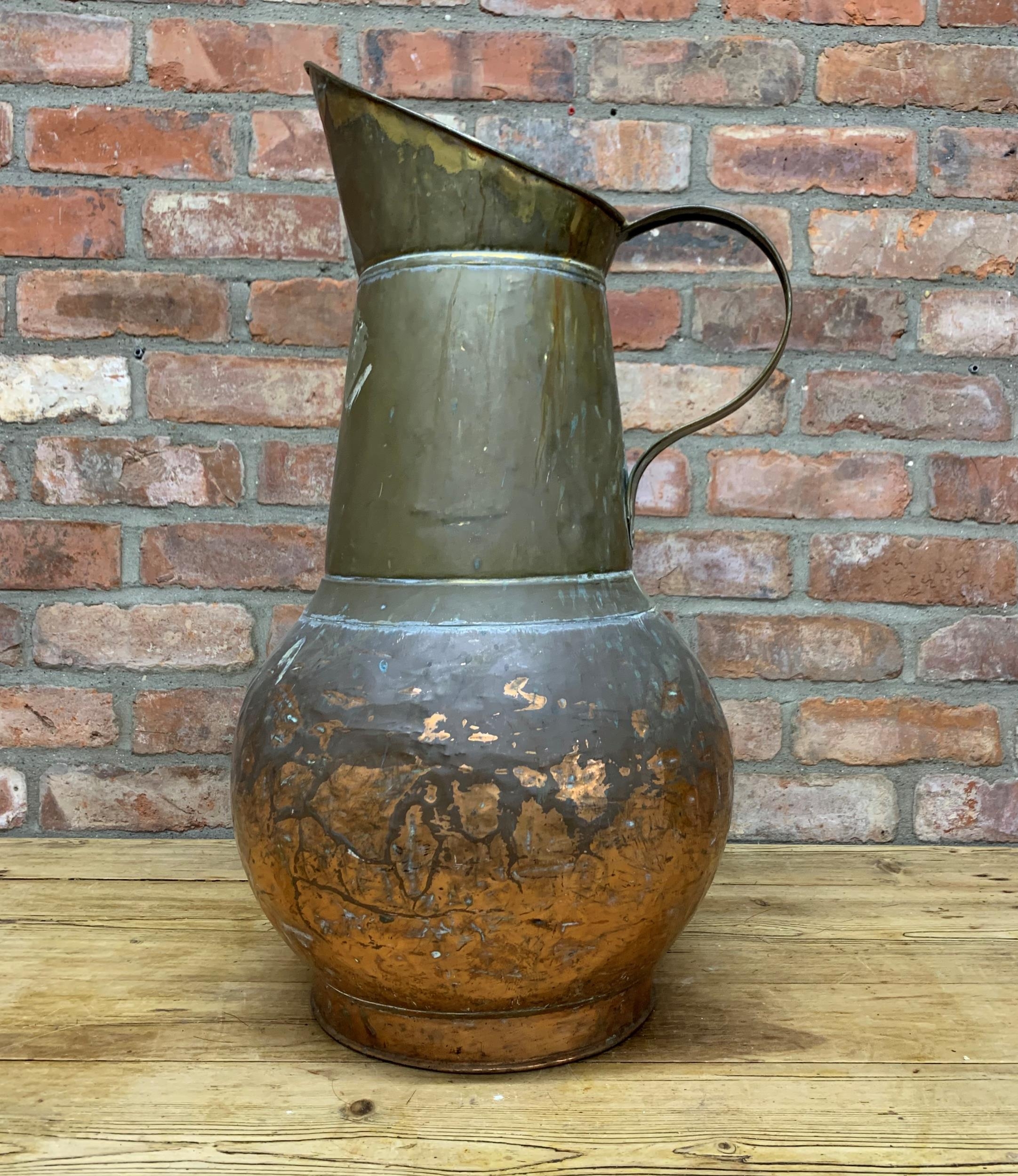 Antique oversized copper and brass Persian ewer, H 69cm