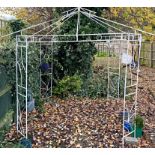 A contemporary metal tubular framed garden arbour (has been dismantled)