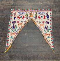 Indian ethnic traditional door Toran with shaped archway, hand embroidered with flowers, deity and