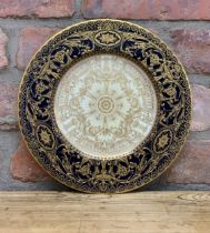 Royal Worcester cabinet plate with ornate raised gold scrolled and floral detailing, D 26cm