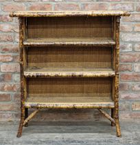 Victorian Aesthetic Movement bamboo and rattan open bookcase with three fitted shelves, H 100cm x