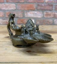 Antique Indian brass three part oil lamp having Ganesh decoration to spout with ornate mythical