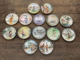 Collection of fourteen hand painted 'Japanese Beauty's' porcelain plates with original boxes and