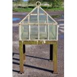 A Victorian painted cast iron garden cloche or terrarium raised on an associated cast iron stand,