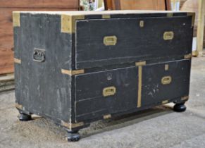 Military ebonised brass bound campaign chest fitted with one long over two short draws with