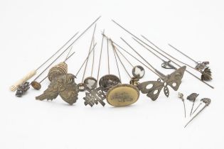 Interesting collection of hat pins of novelty form including silver hallmarked golf club, teddy