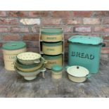 Quantity of green and cream kitchenware enamel to include bread bin, tins and sieves (10)