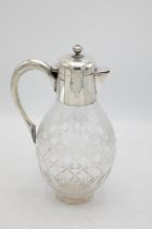 Edwardian silver and glass claret jug in the manner of Christopher Dresser, maker James Dixon & Sons