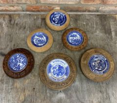 Quantity of hand carved wooden butter dishes with inset Old Willow transfer ceramic dish to