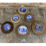 Quantity of hand carved wooden butter dishes with inset Old Willow transfer ceramic dish to